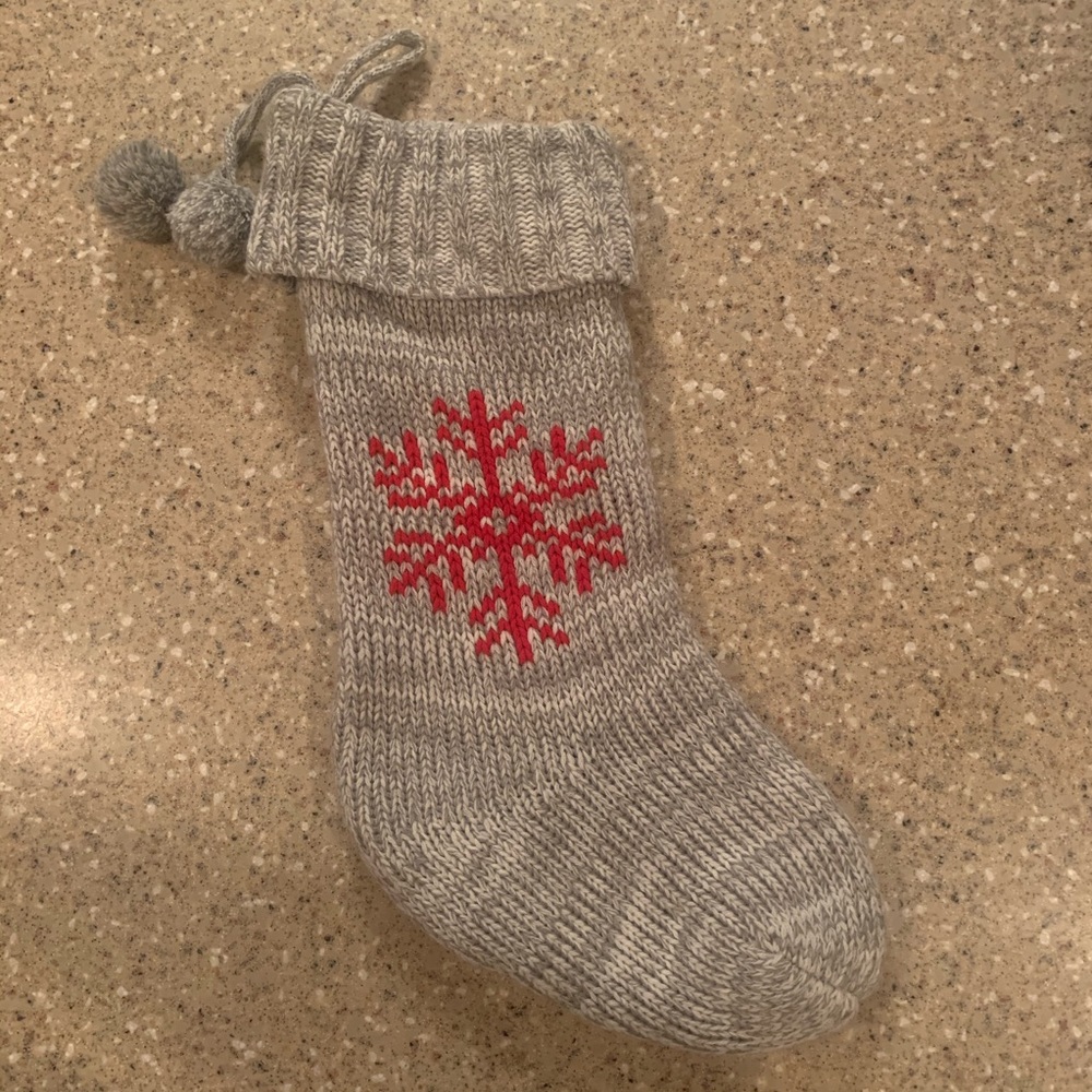 Gray and red knit Christmas stocking
